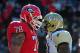 ATHENS, GA - NOVEMBER 24: Watts Dantzler #78 of the Georgia Bulldogs walks past Brandon Watts #11 of the Georgia Tech Yellow Jackets at Sanford Stadium on November 24, 2012 in Athens, Georgia. (Photo by Scott Cunningham/Getty Images)