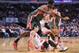 Nov 26, 2012; Chicago, IL, USA; Chicago Bulls shooting guard Kirk Hinrich (12) is fouled by Milwaukee Bucks power forward Ekpe Udoh (13) during the second half at the United Center. The Bucks beat the Bulls 93-92. Mandatory Credit: Rob Grabowski-US PRESSWIRE