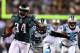PHILADELPHIA, PA - NOVEMBER 26: Bryce Brown #34 of the Philadelphia Eagles carries the ball in for a touchdown as Sherrod Martin #23 of the Carolina Panthers defends on November 26, 2012 at Lincoln Financial Field in Philadelphia, Pennsylvania. (Photo by Elsa/Getty Images)
