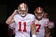 GLENDALE, AZ - DECEMBER 11: Quarterback Alex Smith #11 of the San Francisco 49ers leads teammates out onto the field before the NFL game against the Arizona Cardinals at the University of Phoenix Stadium on December 11, 2011 in Glendale, Arizona. The Cardinals defeated the 49ers 21-19. (Photo by Christian Petersen/Getty Images)