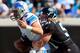 JACKSONVILLE, FL - NOVEMBER 04: Matthew Stafford #9 of the Detroit Lions is tackled by Paul Posluszny #51 of the Jacksonville Jaguars during the game at EverBank Field on November 4, 2012 in Jacksonville, Florida. (Photo by Sam Greenwood/Getty Images)