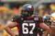 CHICAGO, IL - SEPTEMBER 01: Tyler Pitt #67 of the Northern Illinois Huskies waits for the start of play against the Iowa Hawykeyes at Soldier Field on September 1, 2012 in Chicago, Illinois. Iowa defeated Northern Illinois 18-17. (Photo by Jonathan Daniel/Getty Images)