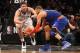 NEW YORK, NY - NOVEMBER 26: Brook Lopez #11 of the Brooklyn Nets and Tyson Chandler #6 of the New York Knicks battle for a loose ball at the Barclays Center on November 26, 2012 in the Brooklyn borough of New York City. NOTE TO USER: User expressly acknowledges and agrees that, by downloading and/or using this photograph, user is consenting to the terms and conditions of the Getty Images License Agreement. The Nets defeated the Knicks 96-89. (Photo by Bruce Bennett/Getty Images)