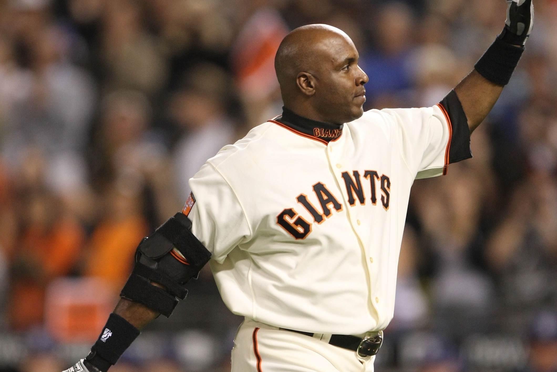 Barry Bonds and Sammy Sosa sharing a laugh before a game, 2007