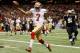 NEW ORLEANS, LA - NOVEMBER 25: Quarterback Colin Kaepernick #7 of the San Francisco 49ers celebrates after scoring a touchdown against the New Orleans Saints at The Mercedes-Benz Superdome on November 25, 2012 in New Orleans, Louisiana. (Photo by Chris Graythen/Getty Images)