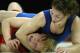 Pictured: McMann (blue leotard)