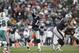 FOXBORO, MA - DECEMBER 24: Tom Brady #12 of the New England Patriots throws against the Miami Dolphins during the second half of New England's 27-24 win at Gillette Stadium on December 24, 2011 in Foxboro, Massachusetts. (Photo by Winslow Townson/Getty Images)