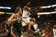 BOSTON, MA - NOVEMBER 02: Jeff Green #8 of the Boston Celticsc cuts to the basket in front of Mike Dunleavy #17 of the Milwaukee Bucks during the game on November 2, 2012 at TD Garden in Boston, Massachusetts. NOTE TO USER: User expressly acknowledges and agrees that, by downloading and or using this photograph, User is consenting to the terms and conditions of the Getty Images License Agreement. (Photo by Jared Wickerham/Getty Images)