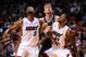Dwyane Wade and Udonis Haslem battle with Tiago Splitter for a rebound in Miami.
