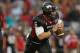 CHICAGO, IL - SEPTEMBER 01: Jordan Lynch #6 of the Northern Illinois Huskies rolls out to look for a receiver against the Iowa Hawkeyes at Soldier Field on September 1, 2012 in Chicago, Illinois. Iowa defeated Northern Illinois 18-17. (Photo by Jonathan Daniel/Getty Images)