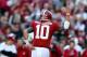 TUSCALOOSA, AL - NOVEMBER 24: AJ McCarron #10 of the Alabama Crimson Tide reacts after a touchdown against the Auburn Tigers at Bryant-Denny Stadium on November 24, 2012 in Tuscaloosa, Alabama. (Photo by Kevin C. Cox/Getty Images)