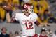 MORGANTOWN, WV - NOVEMBER 17: Landry Jones #12 of the Oklahoma Sooners drops back to pass against the West Virginia Mountaineers during the game on November 17, 2012 at Mountaineer Field in Morgantown, West Virginia. (Photo by Justin K. Aller/Getty Images)