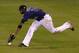 DENVER, CO - SEPTEMBER 11: Center fielder Dexter Fowler #24 of the Colorado Rockies is unable to catch a pop fly by Gregor Blanco #7 of the San Francisco Giants that was blown by the wind in the fourth inning at Coors Field on September 11, 2012 in Denver, Colorado. (Photo by Doug Pensinger/Getty Images)