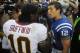 Aug 25, 2012; Landover, MD, USA; Indianapolis Colts quarterback Andrew Luck (12) talks with Washington Redskins quarterback Robert Griffin III (10) after the game at FedEX Field. Mandatory Credit: Brad Mills-US PRESSWIRE