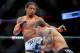 August 11, 2012; Denver, CO, USA; Benson Henderson (left) fights Frankie Edgar (right) during UFC 150 at the Pepsi Center. Mandatory Credit: Ron Chenoy-US PRESSWIRE