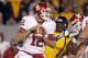 MORGANTOWN, WV - NOVEMBER 17: Landry Jones #12 of the Oklahoma Sooners drops back to pass against the West Virginia Mountaineers during the game on November 17, 2012 at Mountaineer Field in Morgantown, West Virginia. (Photo by Justin K. Aller/Getty Images)