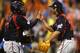 SAN DIEGO - MARCH 19: Closing pitcher Kyuji Fujikawa #22 is congratulated by catcher Shinnosuke Abe #10 after Japan's 6-2 win over Korea during the 2009 World Baseball Classic Round 2 Pool 1 Game 6 on March 19, 2009 at Petco Park in San Diego, California. (Photo by Donald Miralle/Getty Images)