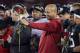 STANFORD, CA - NOVEMBER 30: Stanford Cardinal head coach David Shaw holds up a rose after the Cardinal beat the UCLA Bruins 27-24 in the Pac-12 Championship game at Stanford Stadium on November 30, 2012 in Stanford, California. (Photo by Ezra Shaw/Getty Images)
