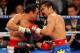 LAS VEGAS, NV - NOVEMBER 12: Juan Manuel Marquez (L) and Manny Pacquiao battle in the 10th round of their WBO world welterweight title fight at the MGM Grand Garden Arena November 12, 2011 in Las Vegas, Nevada. Pacquiao retained his title with a majority decision victory. (Photo by Ethan Miller/Getty Images)