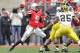 COLUMBUS, OH - NOVEMBER 24: Quarterback Braxton Miller #5 of the Ohio State Buckeyes controls the ball against the Michigan Wolverines at Ohio Stadium on November 24, 2012 in Columbus, Ohio. (Photo by Jamie Sabau/Getty Images)