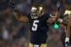 SOUTH BEND, IN - NOVEMBER 17: Manti T'eo #5 of the Notre Dame Fighting Irish encourages the crowd to cheer during a game against the Wake Forest Demon Deacons at Notre Dame Stadium on November 17, 2012 in South Bend, Indiana. Notre Dame defeated Wake Forest 38-0. (Photo by Jonathan Daniel/Getty Images)
