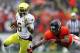 CORVALLIS, OR - NOVEMBER 24: De'Anthony Thomas #6 of the Oregon Ducks runs the ball against Tyrequek Zimmerman #8 of the Oregon State Beavers during the 116th Civil War on November 24, 2012 at the Reser Stadium in Corvallis, Oregon. (Photo by Jonathan Ferrey/Getty Images)