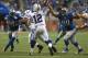DETROIT, MI - DECEMBER 02: Andrew Luck #12 of the Indianapolis Colts gets pressure from Ndamukong Suh #90 and Nick Fairley #98 of the Detroit Lions at Ford Field on December 2, 2012 in Detroit, Michigan. The Colts won 35-33 (Photo by Dave Reginek/Getty Images)