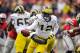 COLUMBUS, OH - NOVEMBER 24: Quarterback Devin Gardner #12 of the Michigan Wolverines controls the ball against the Ohio State Buckeyes at Ohio Stadium on November 24, 2012 in Columbus, Ohio. (Photo by Jamie Sabau/Getty Images)