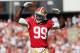 SAN FRANCISCO, CA - OCTOBER 7: Linebacker Aldon Smith #99 of the San Francisco 49ers amps up the crowd against the Buffalo Bills in the first quarter on October 7, 2012 at Candlestick Park in San Francisco, California. The 49ers won 45-3. (Photo by Brian Bahr/Getty Images)