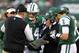 Dec 2, 2012; East Rutherford, NJ, USA; New York Jets head coach Rex Ryan (left) talks with quarterback Greg McElroy (14) and quarterback Mark Sanchez (6) during the game against the Arizona Cardinals at Metlife Stadium. Mandatory Credit: John Munson/THE STAR-LEDGER via USA TODAY Sports