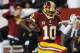 LANDOVER, MD - DECEMBER 03: Quarterback Robert Griffin III #10 of the Washington Redskins runs for a 46-yard gain as he is taken down by Stevie Brown #27 of the New York Giants in the second half at FedExField on December 3, 2012 in Landover, Maryland. (Photo by Rob Carr/Getty Images)