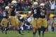 SOUTH BEND, IN - OCTOBER 20: Manti T'eo #5 of the Notre Dame Fighting Irish celebrates with Dan Fox #48 (L) and Matthias Farley #41 after intercepting a pass against of the BYU Cougars at Notre Dame Stadium on October 20, 2012 in South Bend, Indiana. Niotre Dame defeated BYU 17-14. (Photo by Jonathan Daniel/Getty Images)