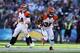 SAN DIEGO, CA - DECEMBER 02: Running back Cedric Peerman #30 of the Cincinnati Bengals carries the ball, as quarterback Andy Dalton #14 looks on against the San Diego Chargers at Qualcomm Stadium on December 2, 2012 in San Diego, California. (Photo by Jeff Gross/Getty Images)