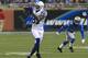 DETROIT, MI - DECEMBER 02: Reggie Wayne #87 of the Indianapolis Colts catches a pass in front of Chris Houston #23 of the Detroit Lions at Ford Field on December 2, 2012 in Detroit, Michigan. (Photo by Dave Reginek/Getty Images)