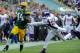 DEc 2, 2012; Green Bay, WI, USA; Green Bay Packers running back James Starks (44) scores on a 22-yard touchdown run against the Minnesota Vikings in the 3rd quarter at Lambeau Field. Mandatory Credit: Benny Sieu-USA TODAY Sports