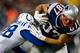FOXBORO, MA - NOVEMBER 18: Rob Gronkowski #87 of the New England Patriots attempts to run through a tackle after catching a pass against the Indianapolis Colts during the game on November 18, 2012 at Gillette Stadium in Foxboro, Massachusetts. (Photo by Jared Wickerham/Getty Images)