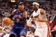 MIAMI, FL - MAY 09: Forward LeBron James #6 of the Miami Heat defends Forward Carmelo Anthony#7 of the New York Knicks in Game Five of the Eastern Conference Quarterfinals in the 2012 NBA Playoffs on May 9, 2012 at the American Airines Arena in Miami, Florida. NOTE TO USER: User expressly acknowledges and agrees that, by downloading and or using this photograph, User is consenting to the terms and conditions of the Getty Images License Agreement. (Photo by Marc Serota/Getty Images)