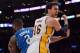 LOS ANGELES, CA - DECEMBER 02: Pau Gasol #16 of the Los Angeles Lakers reacts after he is fouled by Kyle O'Quinn #2 of the Orlando Magic during a 113-103 Magic win at Staples Center on December 2, 2012 in Los Angeles, California. NOTE TO USER: User expressly acknowledges and agrees that, by downloading and or using this photograph, User is consenting to the terms and conditions of the Getty Images License Agreement. (Photo by Harry How/Getty Images)