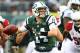 EAST RUTHERFORD, NJ - DECEMBER 02: Greg McElroy #14 of the New York Jets passes against the Arizona Cardinals during their game at at MetLife Stadium on December 2, 2012 in East Rutherford, New Jersey. (Photo by Al Bello/Getty Images)