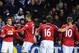 READING, ENGLAND - DECEMBER 01: Robin van Persie of Manchester United celebrates scoring a goal with teammates Chris Smalling, Michael Carrick and Wayne Rooney during the Barclays Premier League match between Reading and Manchester United at Madejski Stadium on December 1, 2012 in Reading, England. (Photo by Michael Regan/Getty Images)