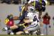 MORGANTOWN, WV - OCTOBER 20: Josh Francis #4 of the West Virginia Mountaineers sacks Collin Klein #7 of the Kansas State Wildcats during the game on October 20, 2012 at Mountaineer Field in Morgantown, West Virginia. The Wildcats defeated the Mountaineers 55-14. (Photo by Justin K. Aller/Getty Images)