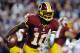 LANDOVER, MD - DECEMBER 03: Robert Griffin III #10 of the Washington Redskins scrambles with the ball in the second half against the New York Giants at FedExField on December 3, 2012 in Landover, Maryland. (Photo by Patrick McDermott/Getty Images)