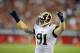Nov. 25, 2012; Glendale, AZ, USA: St. Louis Rams defensive end Chris Long celebrates a score in the second half against the Arizona Cardinals at University of Phoenix Stadium. The Rams defeated the Cardinals 31-17. Mandatory Credit: Mark J. Rebilas-USA TODAY Sports