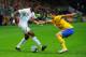 STOCKHOLM, SWEDEN - NOVEMBER 14: Wilfried Zaha of England in action with Behrangt Safari of Sweden during the international friendly match between Sweden and England at the Friends Arena on November 14, 2012 in Stockholm, Sweden. (Photo by Michael Regan/Getty Images)