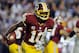 LANDOVER, MD - DECEMBER 03: Robert Griffin III #10 of the Washington Redskins scrambles with the ball in the second half against the New York Giants at FedExField on December 3, 2012 in Landover, Maryland. (Photo by Patrick McDermott/Getty Images)