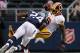 ARLINGTON, TX - NOVEMBER 22: Morris Claiborne #24 of the Dallas Cowboys makes the tackle against Josh Morgan #15 of the Washington Redskins on Thanksgiving Day at Cowboys Stadium on November 22, 2012 in Arlington, Texas. (Photo by Tom Pennington/Getty Images)