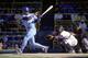 1990: Bo Jackson #16 of the Kansas City Royals watches the flight of the ball as he follows through on his swing during a game in the 1990 season. (Photo by Jonathan Daniel/Getty Images)