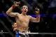 Apr 21, 2012; Atlanta, GA, USA; Rory MacDonald celebrates beating Chad Mills in a welterweight bout during UFC 145 at Philips Arena. MacDonald won the bout by technical knock out. Mandatory Credit: Paul Abell-USA TODAY Sports