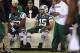 Nov 22, 2012; East Rutherford, NJ, USA; New York Jets quarterback Tim Tebow (15) sits on the bench during the second half against the New England Patriots on Thanksgiving at Metlife Stadium. Patriots defeated the Jets 49-19. Mandatory Credit: Ed Mulholland-USA TODAY Sports