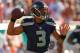 MIAMI GARDENS, FL - NOVEMBER 25: Russell Wilson #3 of the Seattle Seahawks passes during a game against the Miami Dolphins at Sun Life Stadium on November 25, 2012 in Miami Gardens, Florida. (Photo by Mike Ehrmann/Getty Images)